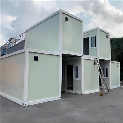 Casa contenedor de paquete plano desmontable